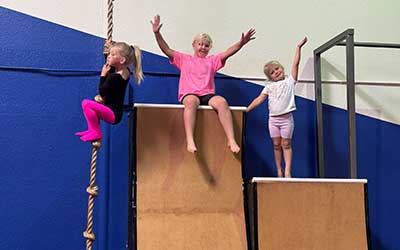 Young girl celebrating at cheer class