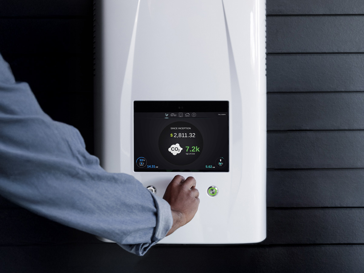 Person turning the dial on a home battery to control their energy use