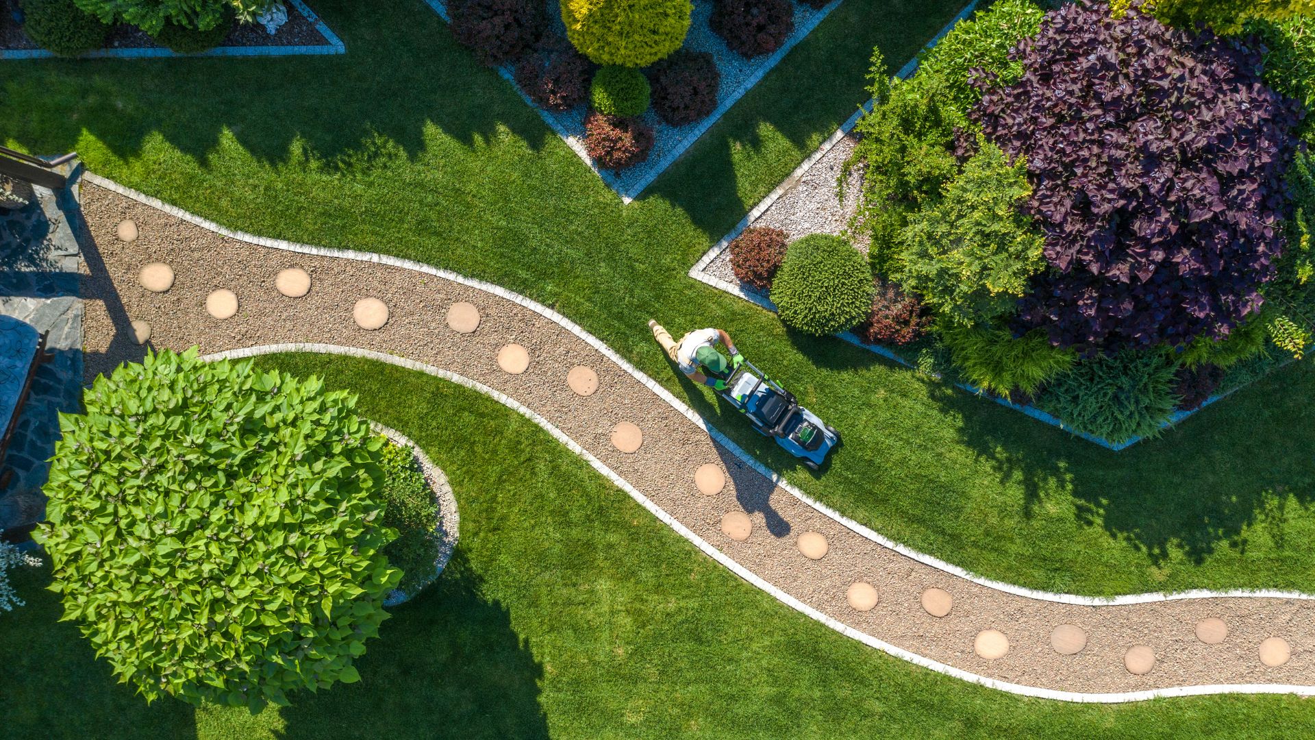 Aerial_Shot_Guy_Mowing_Lawn