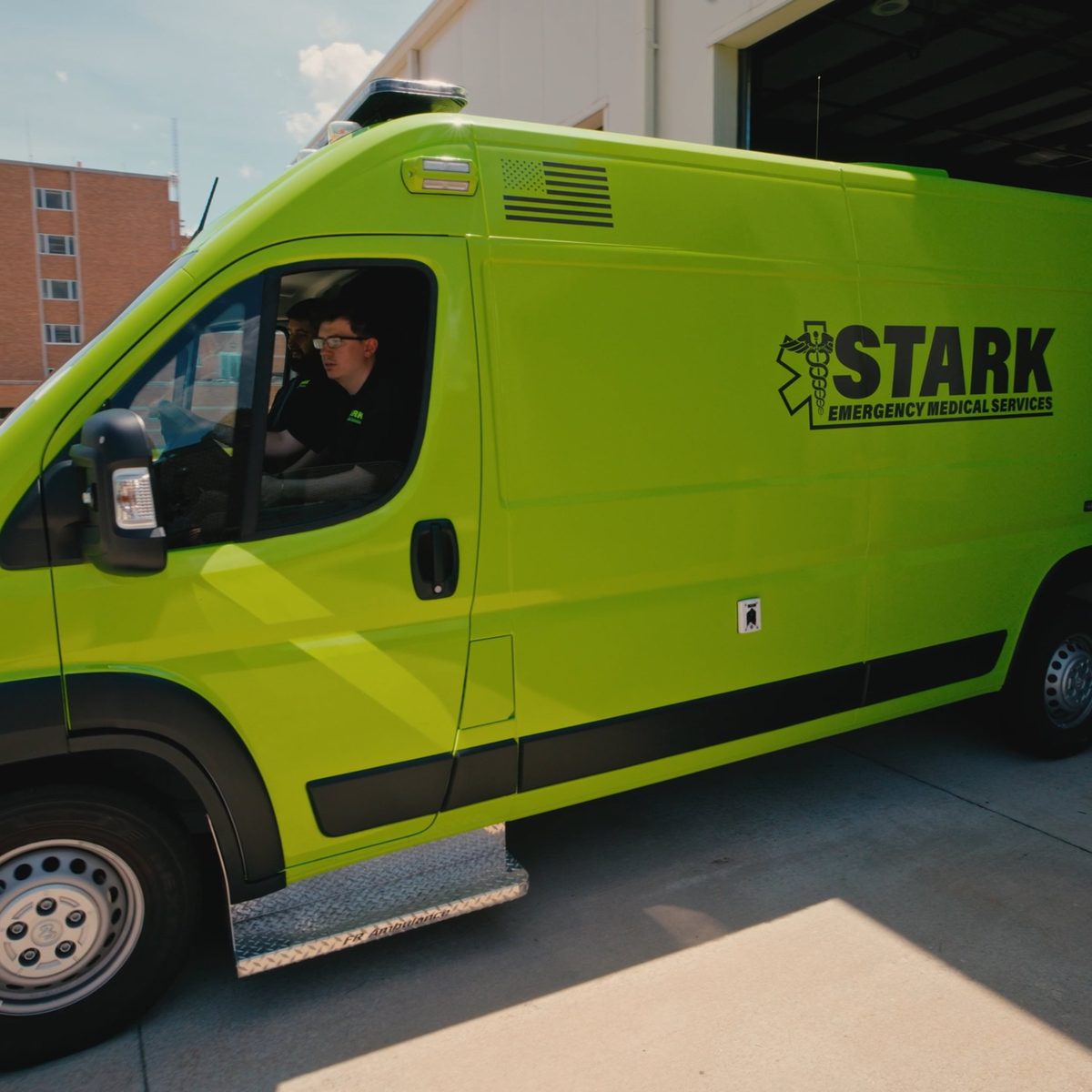 Stark Emergency Medical Services ambulance van pulling out of the station, filmed by Identity Start