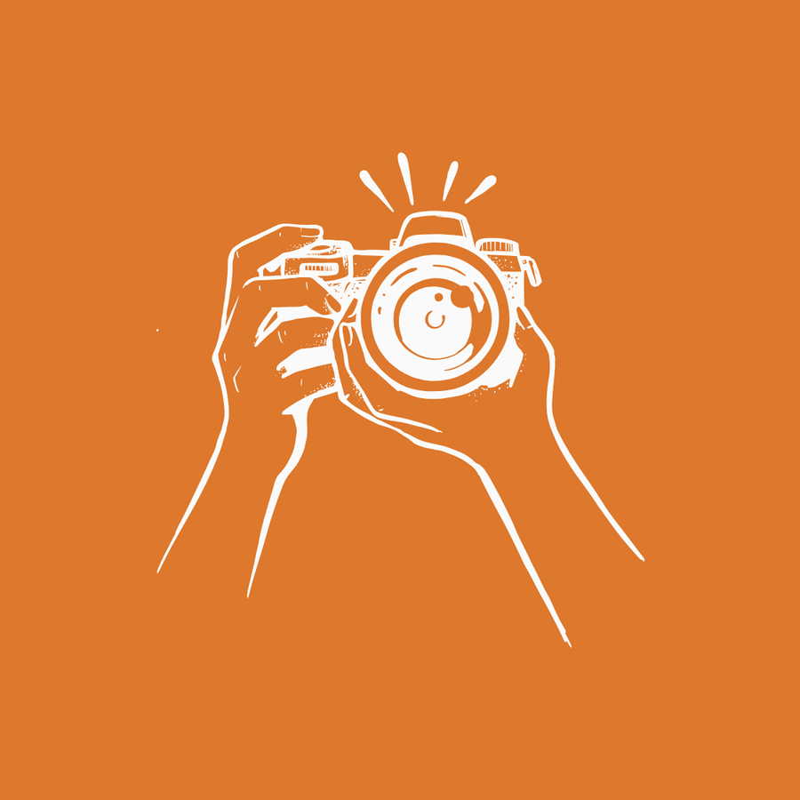 Illustration of two hands holding a camera with the flash activated on an orange background.
