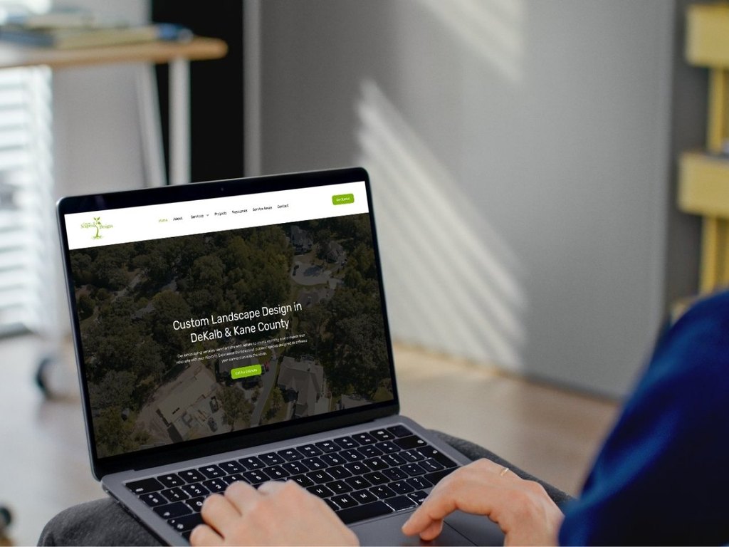 Custom Scapes & Designs website with its logo, designed by Identity Start, shown on a laptop