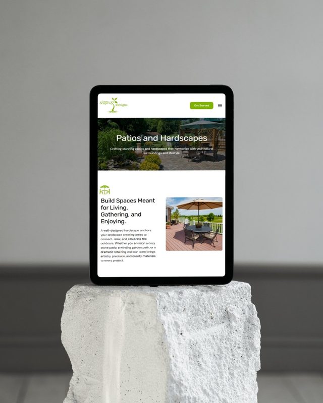 Custom Scapes & Designs website on a tablet, designed by Identity Start