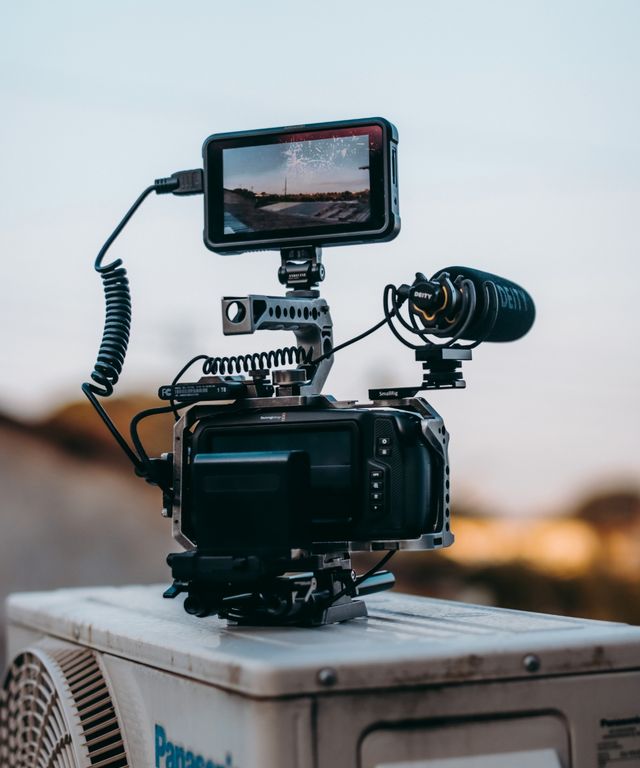 Video camera rig with an external monitor and microphone