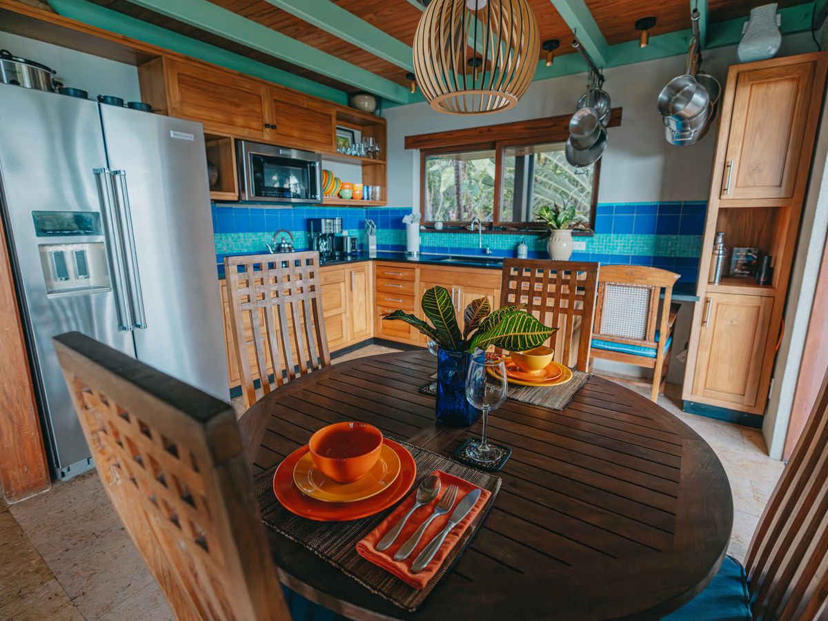 Moon Cottage kitchen and dining table set with colorful dishes
