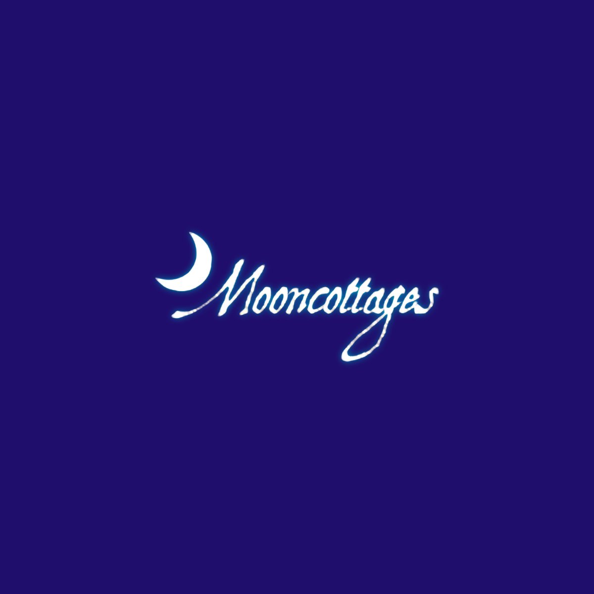 Mooncottages crescent moon script logo on a deep indigo background