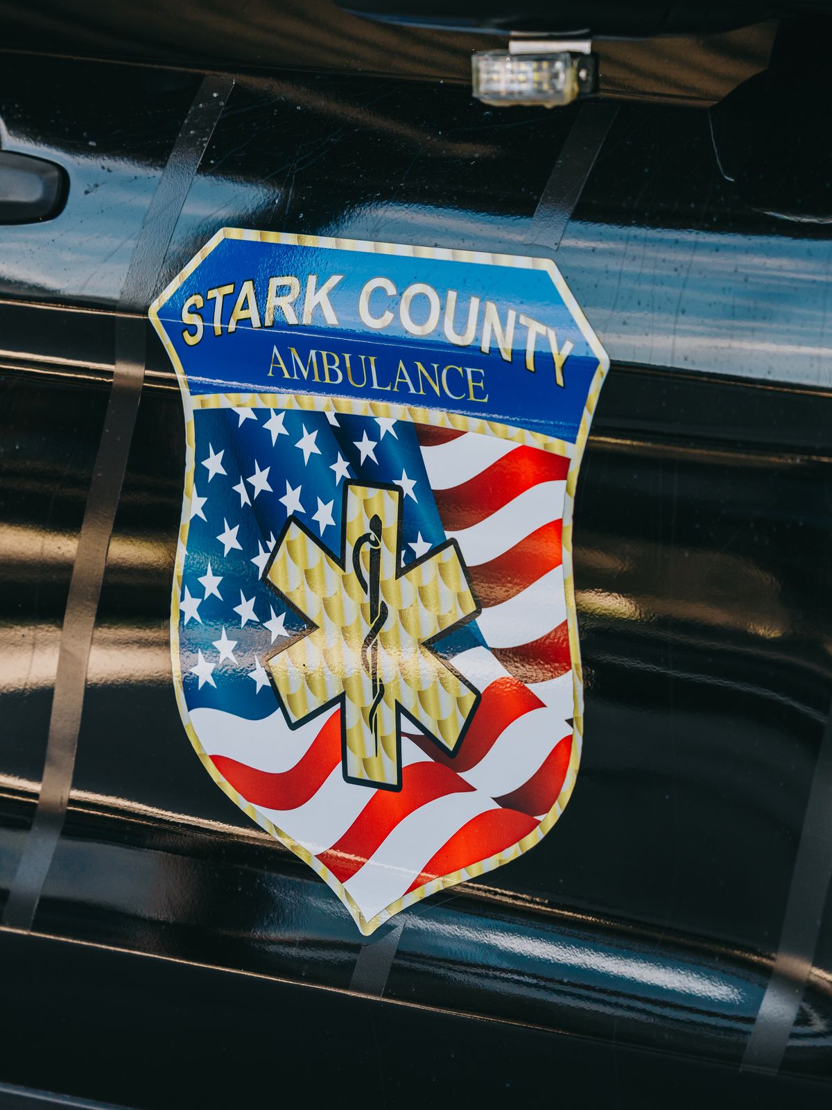 Stark County Ambulance star of life shield decal with an American flag design