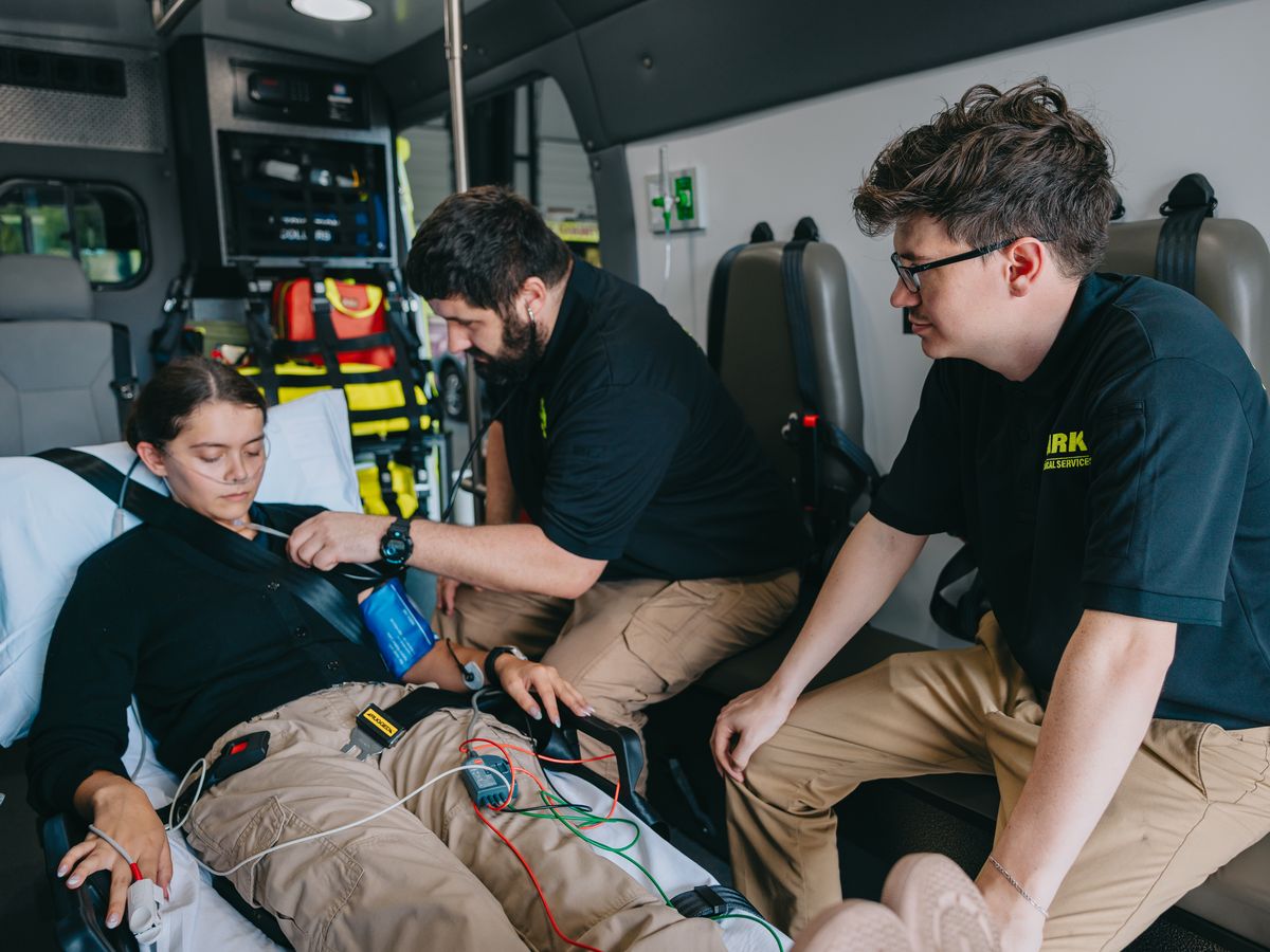 Stark County Ambulance paramedics treating a patient inside the ambulance