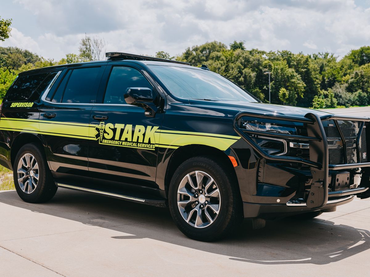 Black Stark County Ambulance supervisor Tahoe with lime green striping