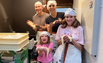 Family enjoying a hands-on Ramen-making experience in Japan.