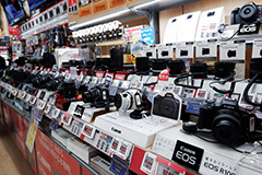 Camera section at BicCamera featuring various models from popular brands
