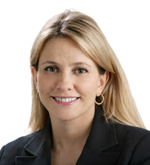Smiling woman with blonde hair wearing a black blazer and hoop earrings against a white background.