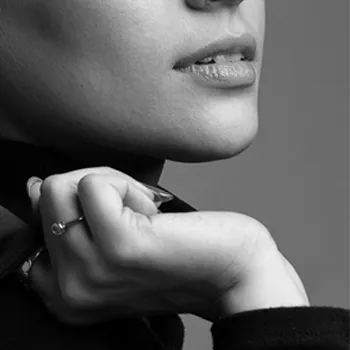 Short nails long fingers accentuated by beautiful manicure to showcase healthy cuticles 