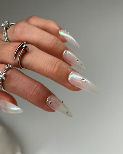 Close-up of a manicured hand displaying professional nail enhancement by The All G Nails and Spa in Kitchener, Ontario.