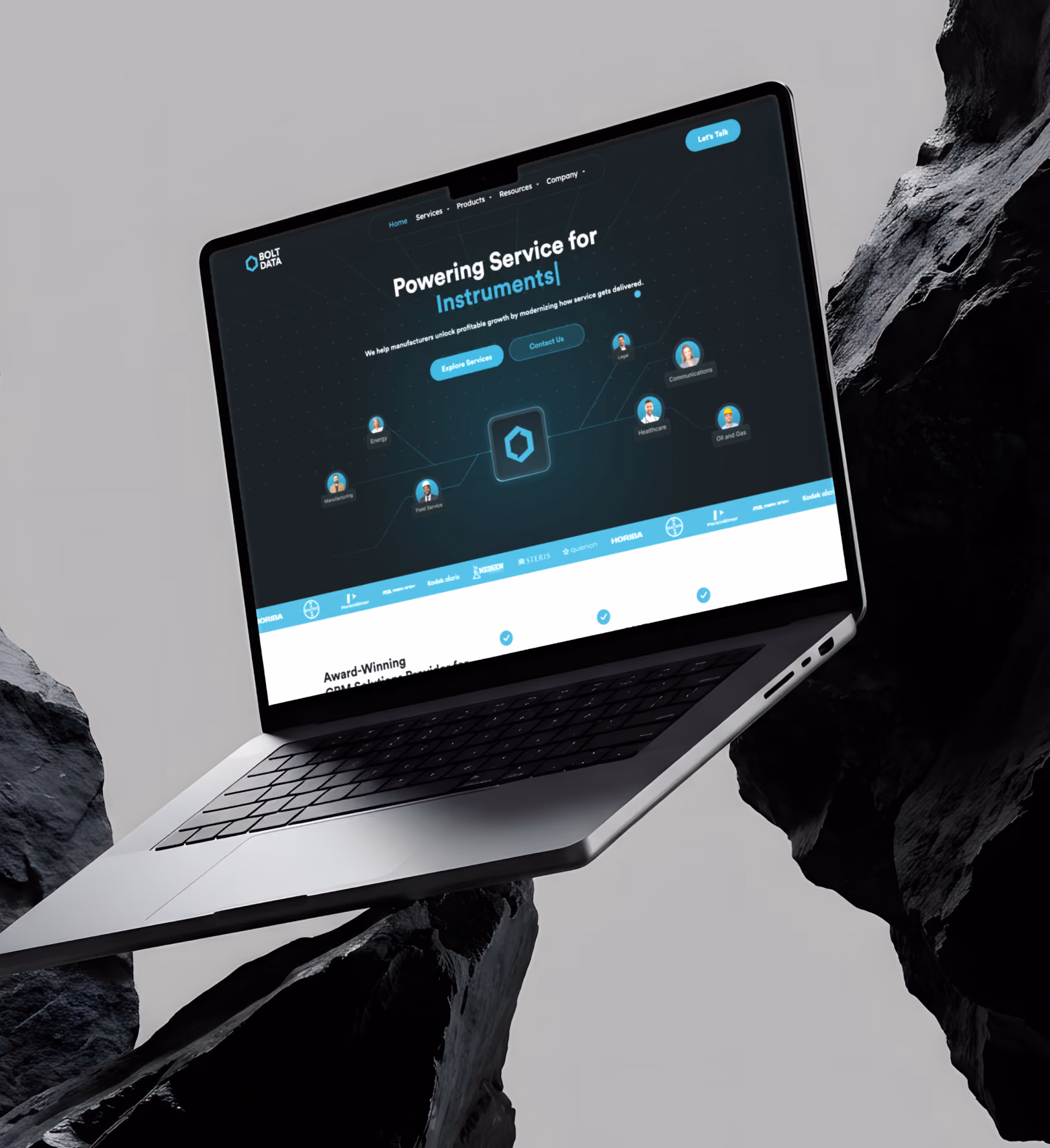 Bolt Data Webflow website design by Flowfye, displayed on a laptop between dark rock formations.