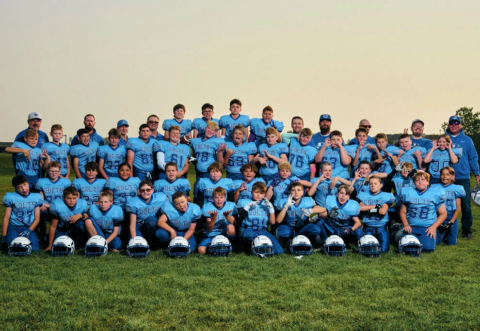 Large Calgary youth football team group photo of the South Calgary Colts captured during Media Day by Media&Motion.