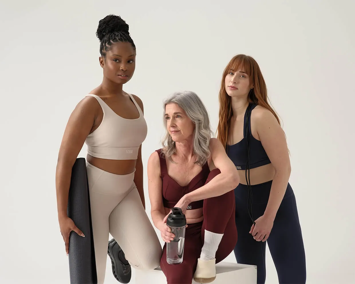 Calgary yoga-inspired fashion campaign for Vinni The Label by Media&Motion - diverse models in activewear captured in a minimal studio, reflecting balance, confidence, and modern lifestyle branding.