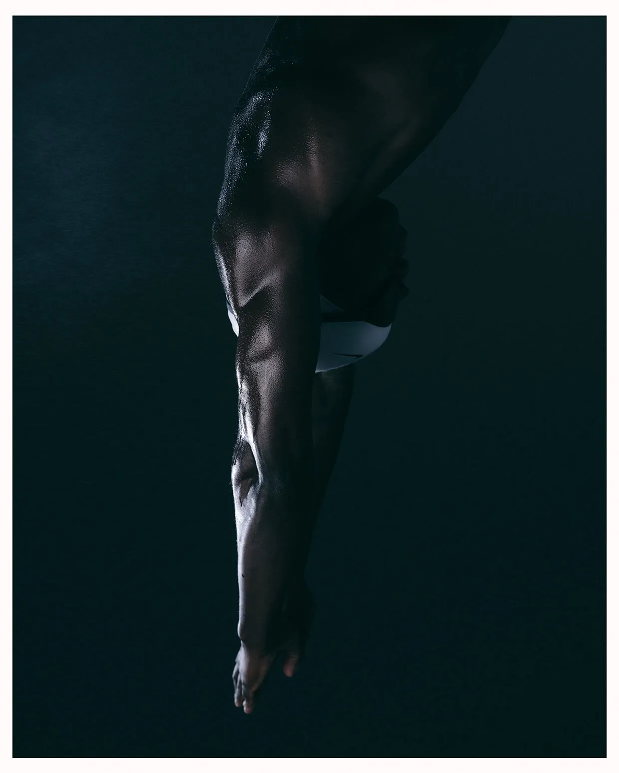 Calgary swimmer portrait by Media&Motion - creative production capturing strength, precision, and motion through professional sports photography.