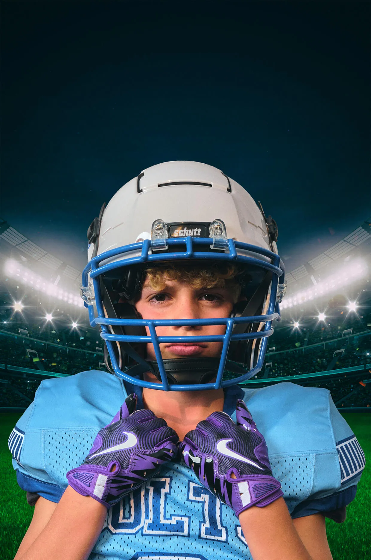 Calgary youth football player portrait from South Calgary Colts Media Day by Media&Motion - professional lighting and stadium backdrop emphasizing focus, determination, and athletic pride.