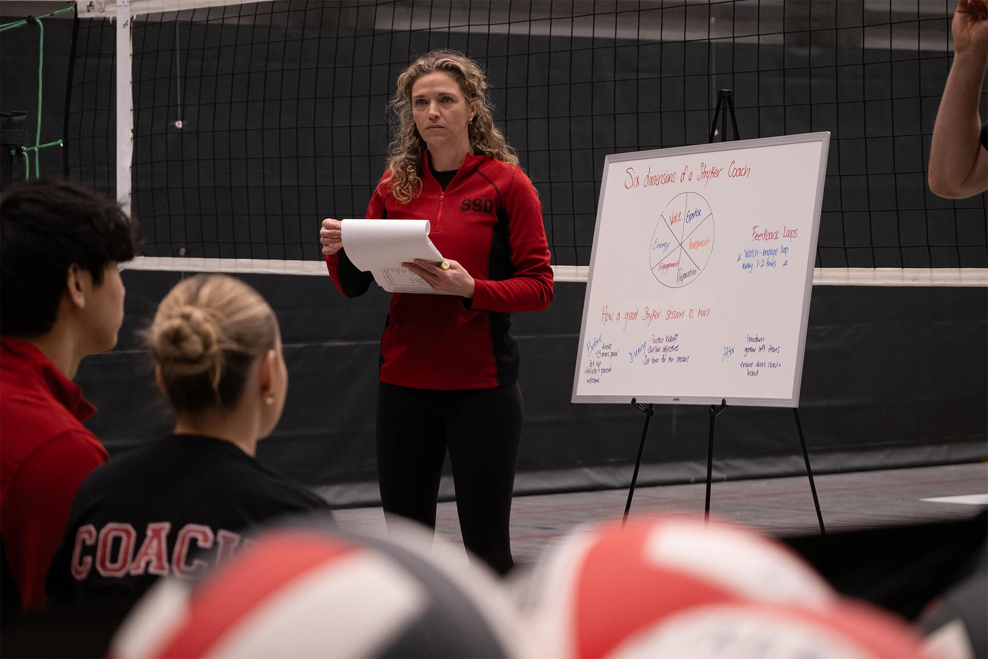 Coaching seminar session at Stryker Sports focused on athlete development and program philosophy.