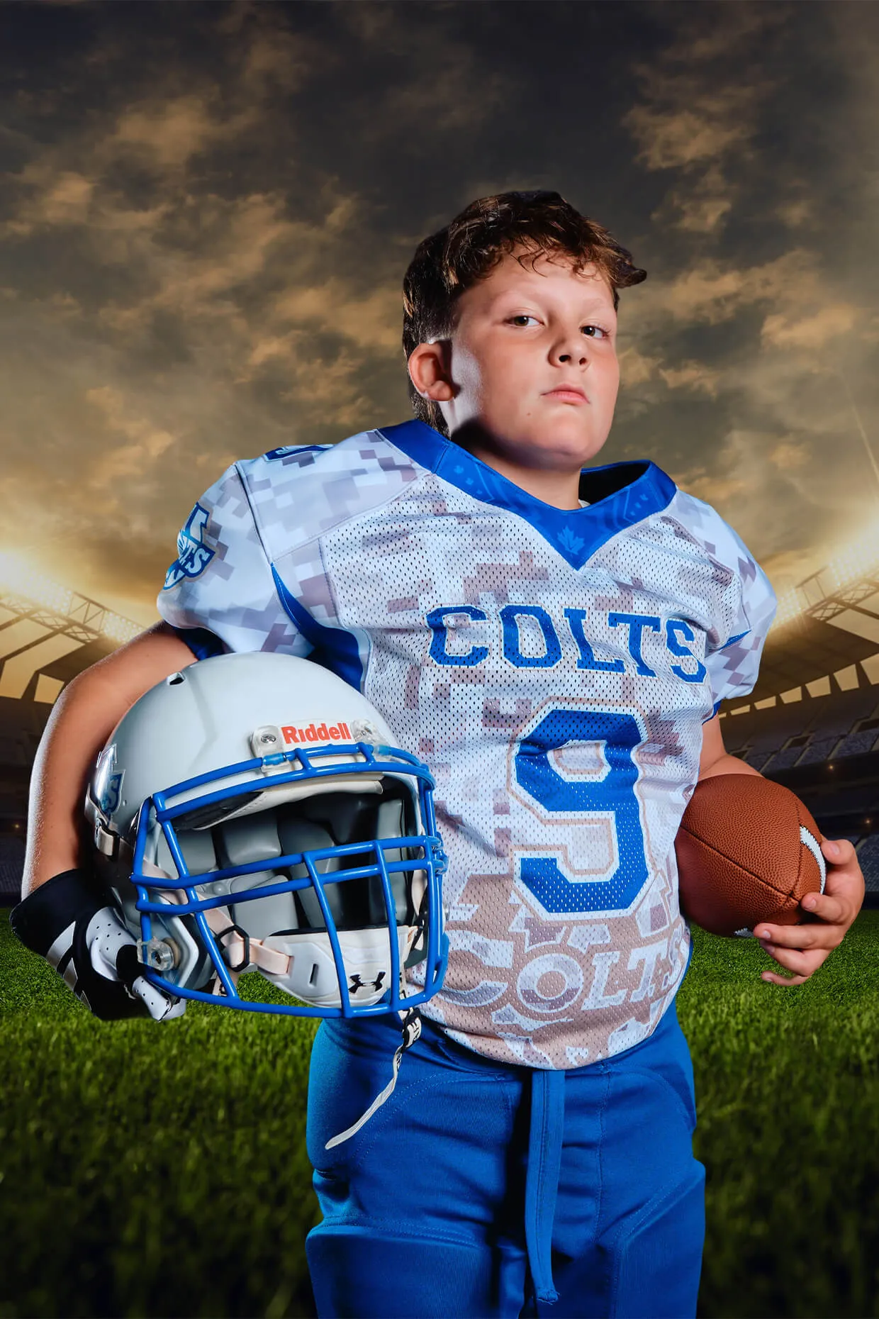 Youth football portrait with stadium-style composite background created during professional Media Day.