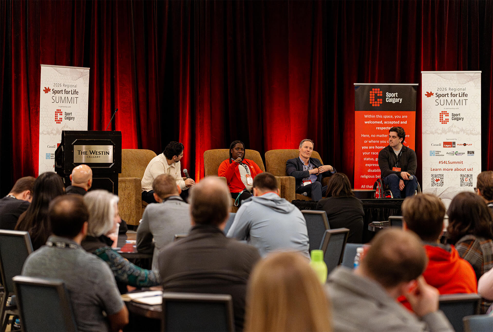 Panel discussion at Sport for Life Summit addressing physical literacy and long-term athlete development in Canada.