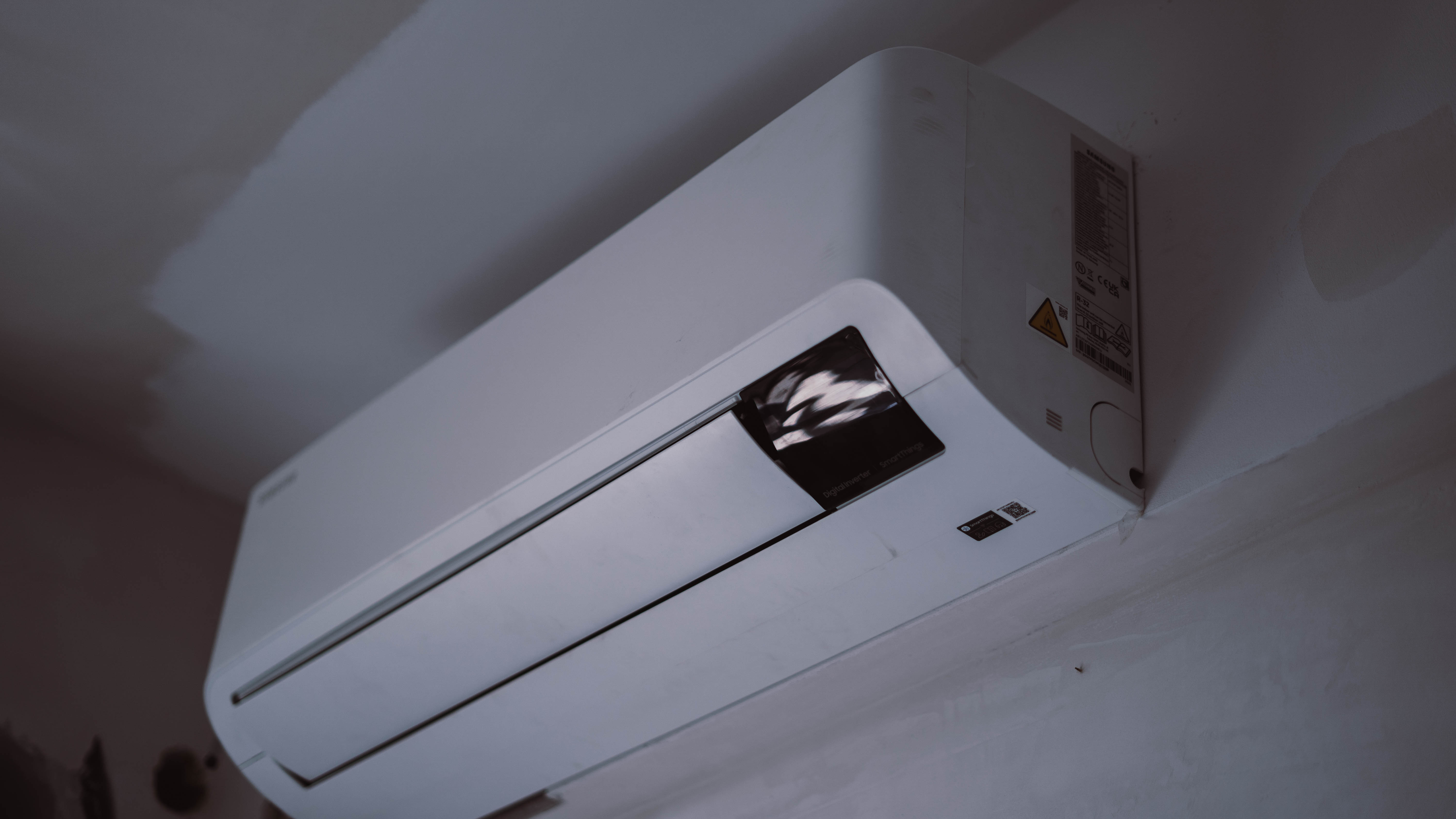 image of a technician installing solar panels