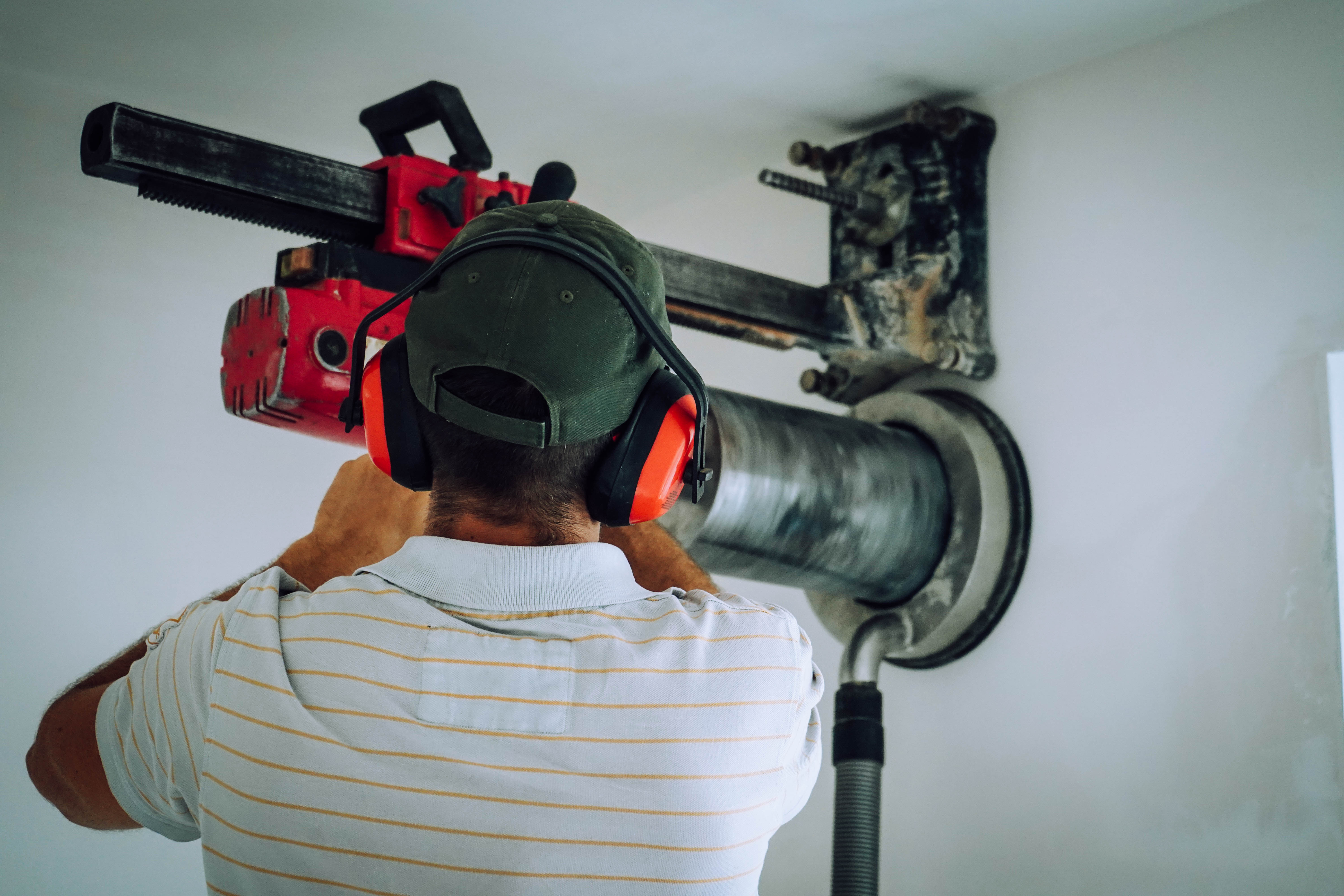 image of a technician installing solar panels