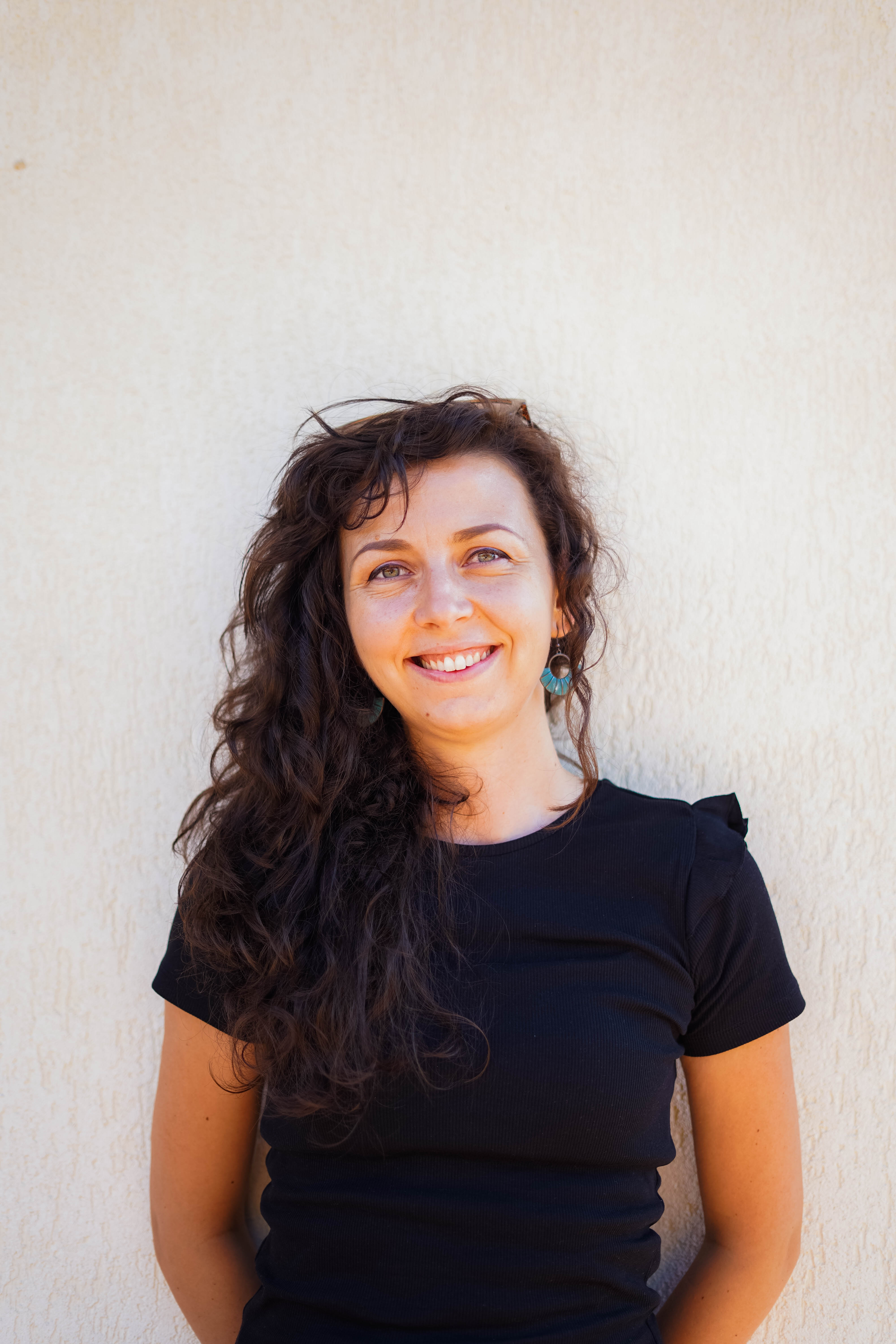 image of busy office with team collaborating (for a fintech company)