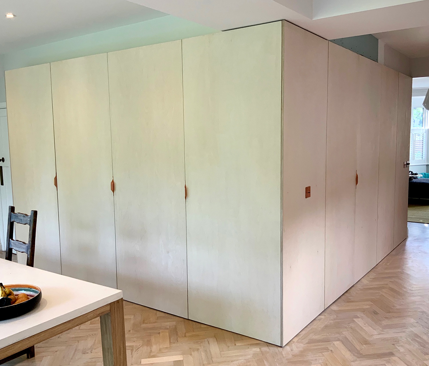 Kitchen storage wall by the Greenwich Alcove Company