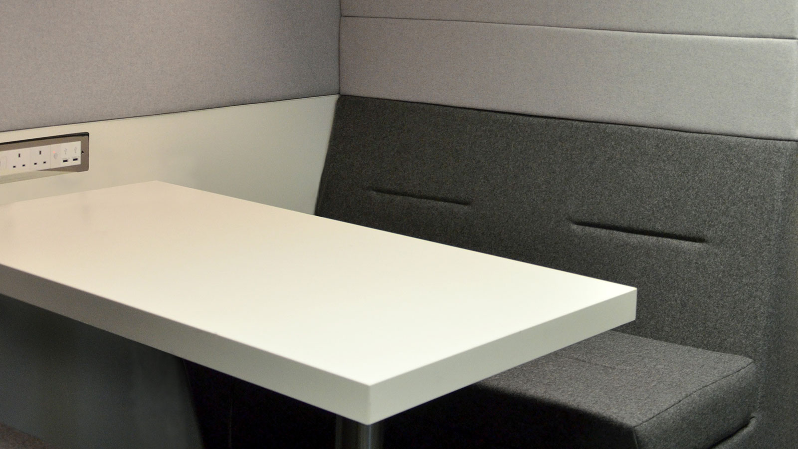 Button-fix furniture applications include banquette seating and wall panelling in office pods