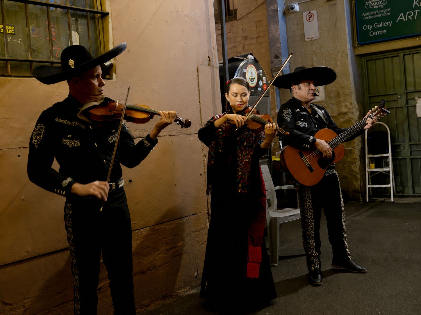 Mariachi trio in traditional dress playing at Esteban, Sydney