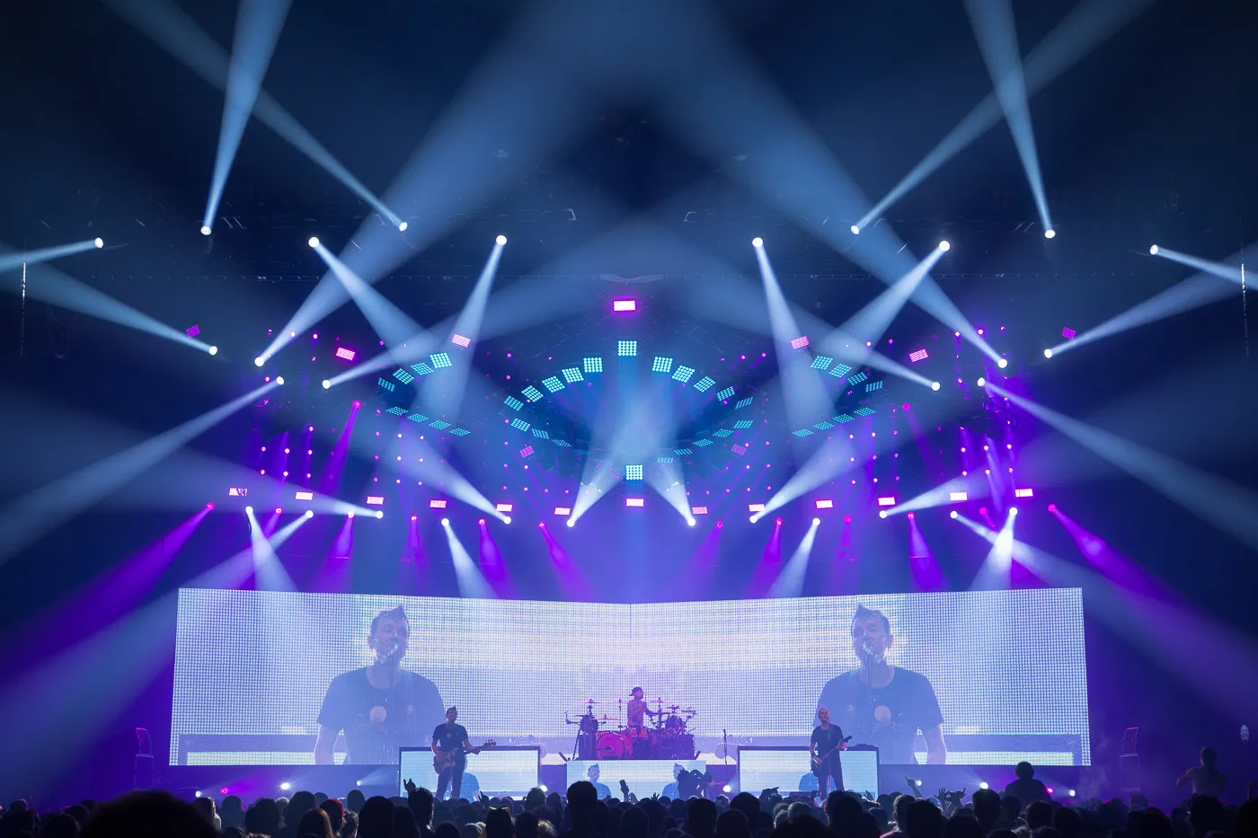 Blink 182 on stage with a spectacular stage show around them