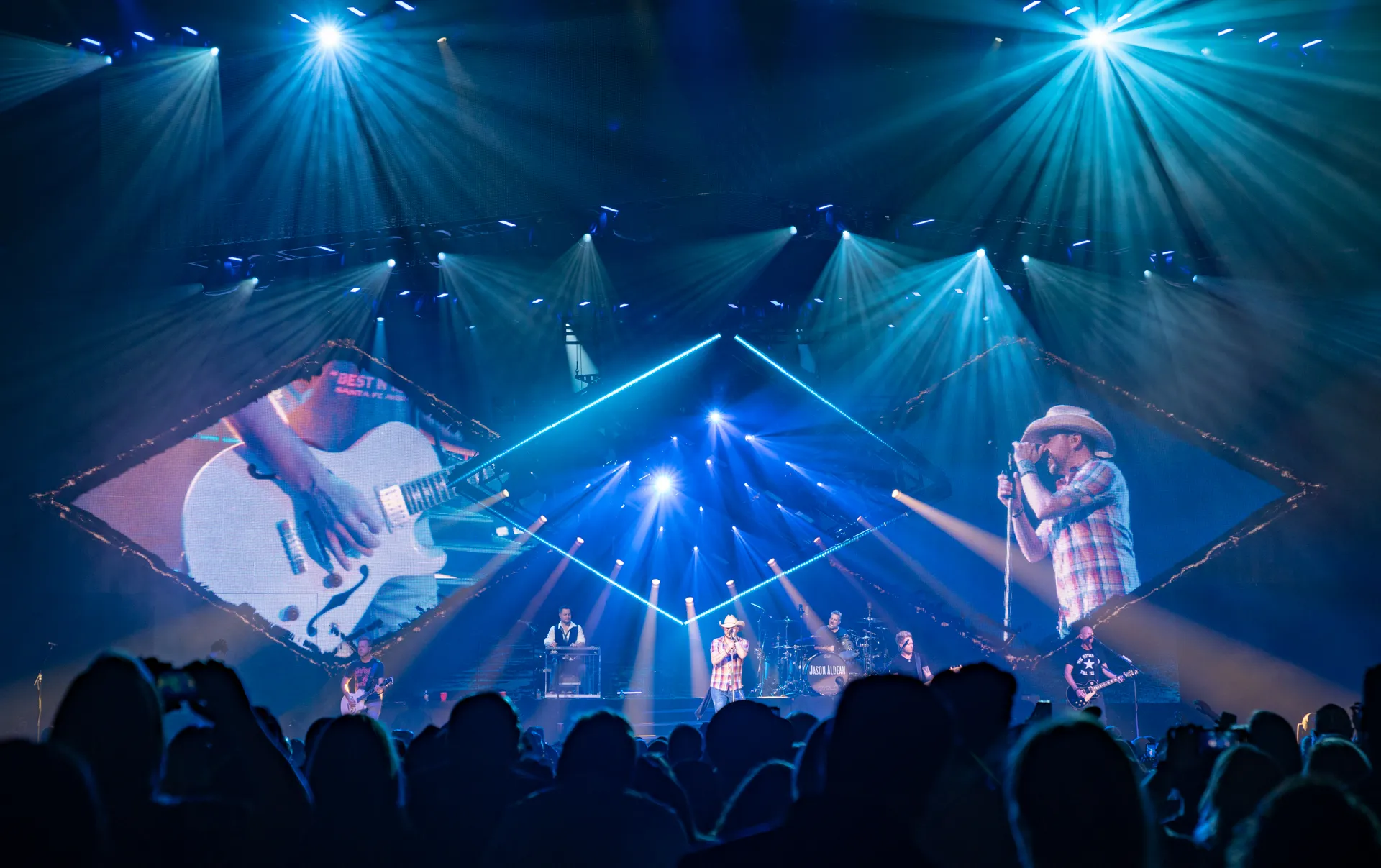 Jason Aldean performing on the Ride All Night Tour