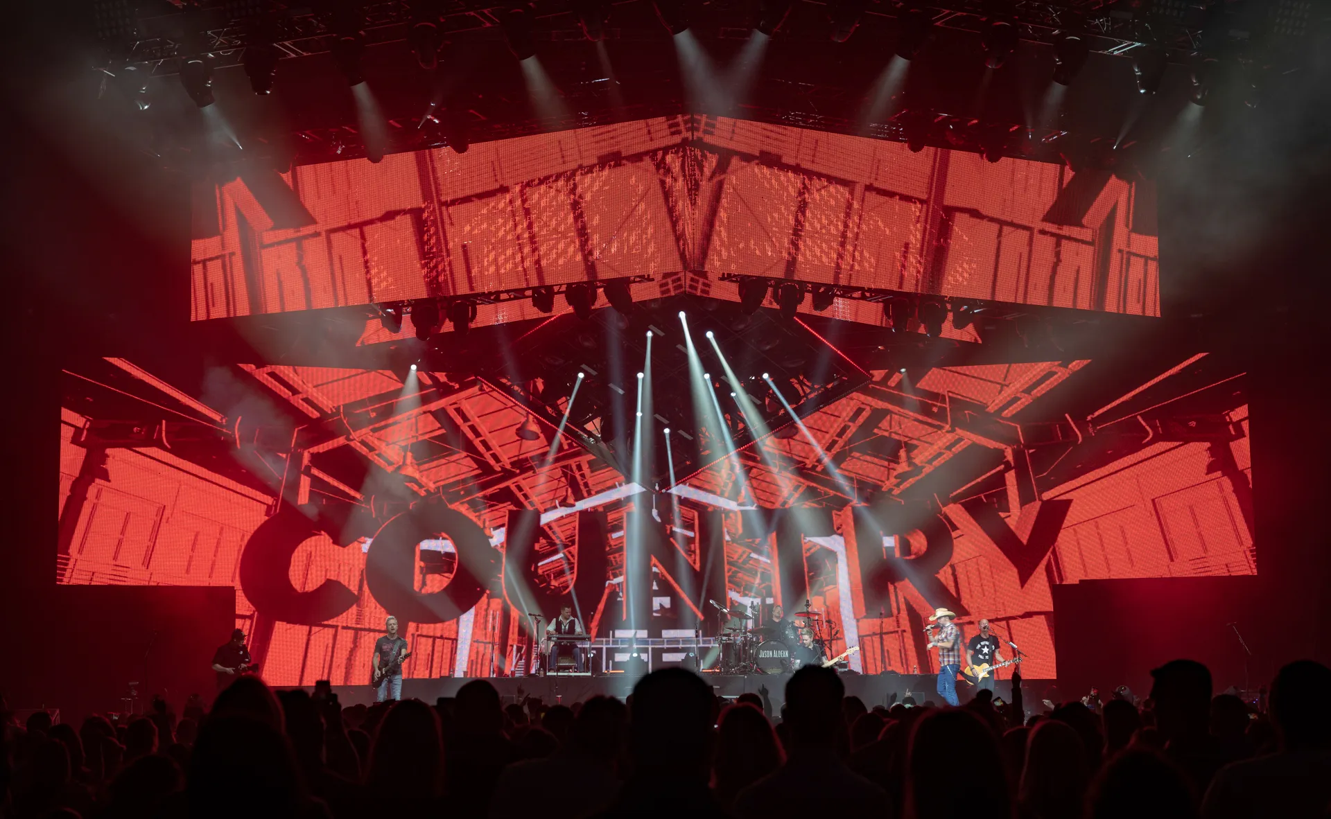 Jason Aldean performing on the Ride All Night Tour