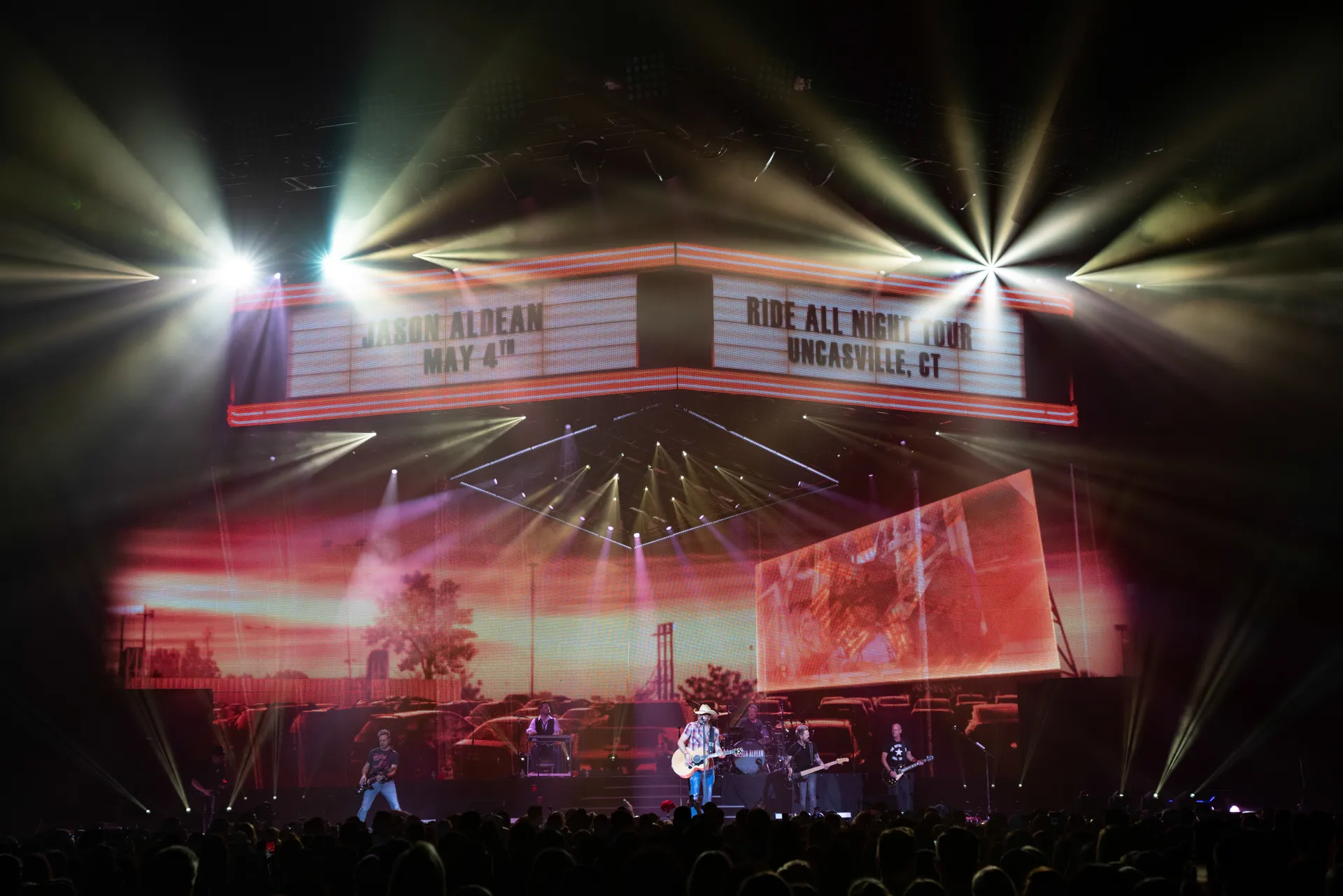 Jason Aldean performing on the Ride All Night Tour