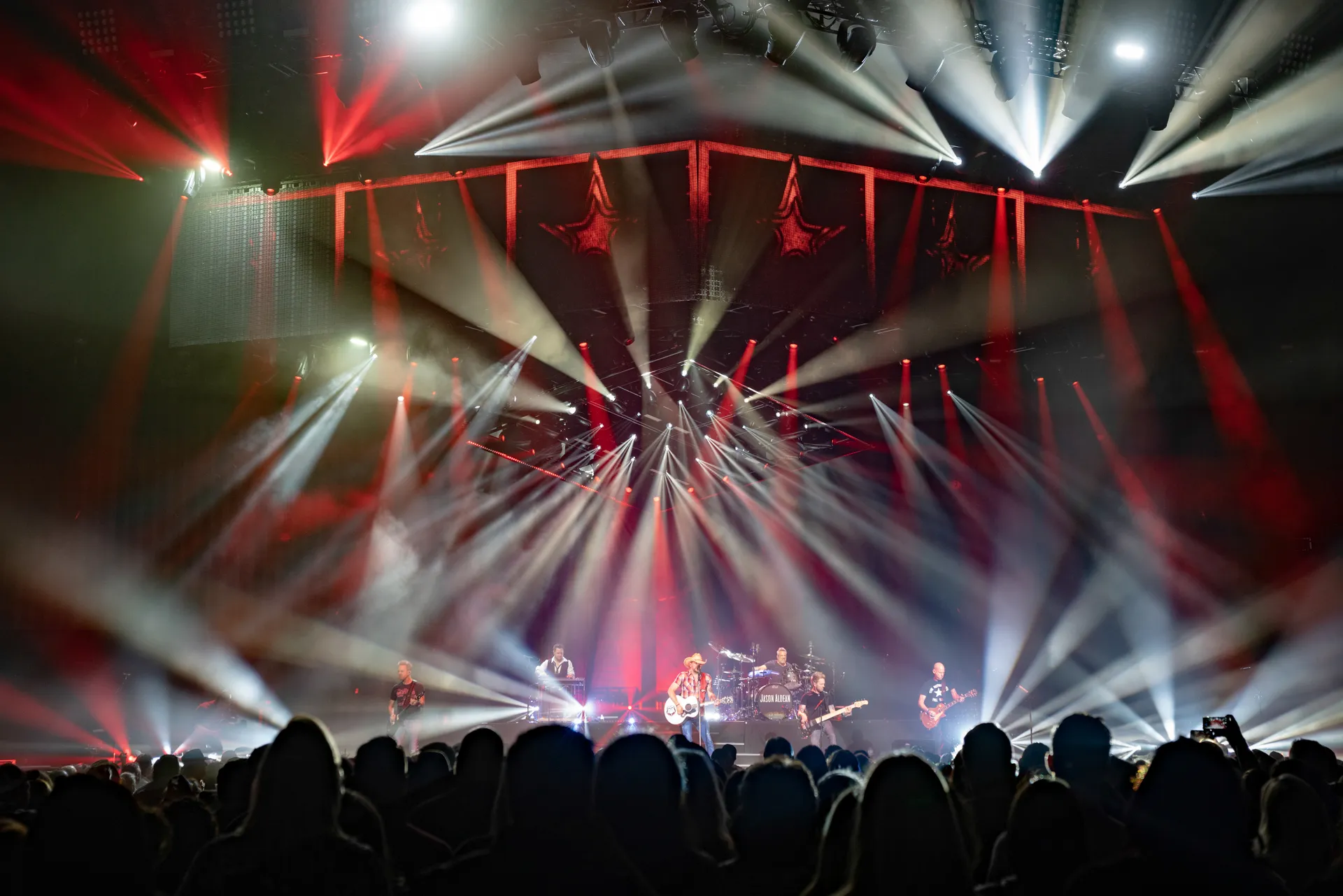 Jason Aldean performing on the Ride All Night Tour
