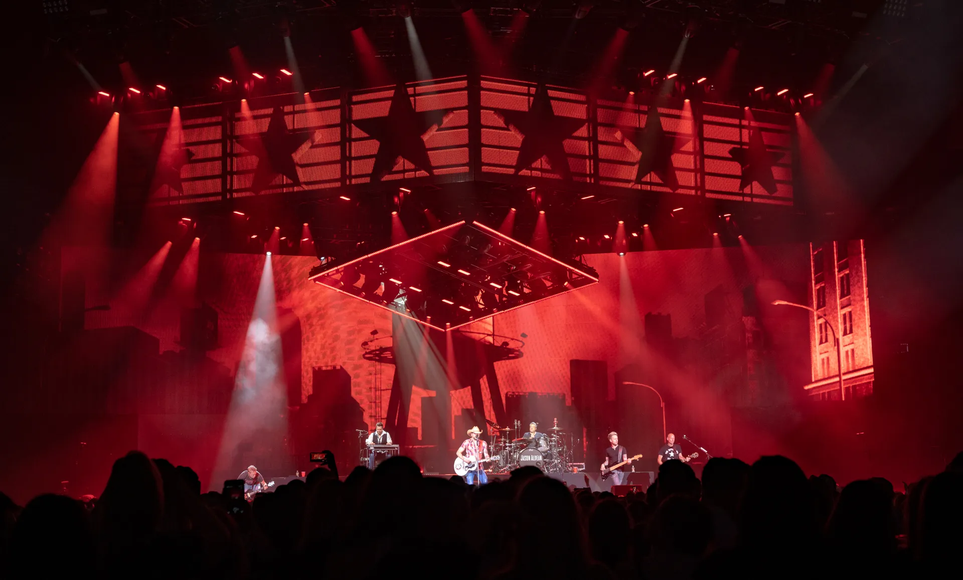 Jason Aldean performing on the Ride All Night Tour