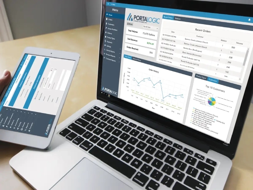 A laptop displaying the Portalogic 7 management software.