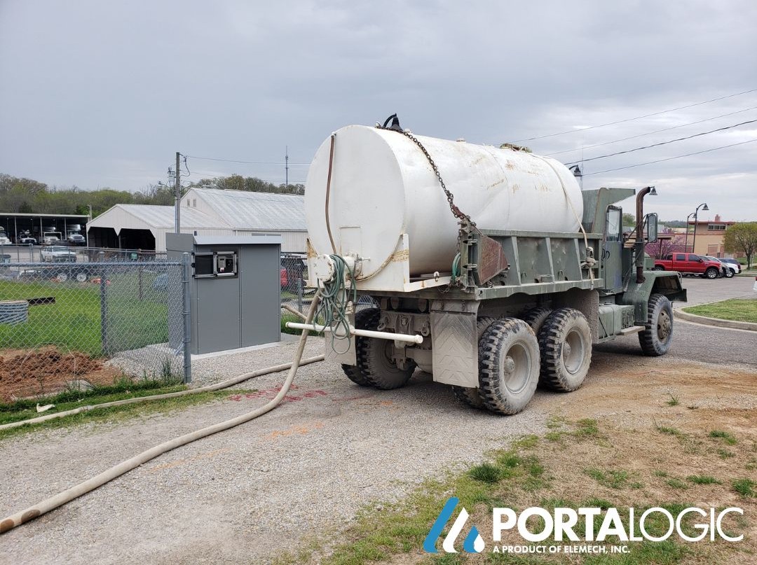 Hauler truck buys water from bulk water salesman