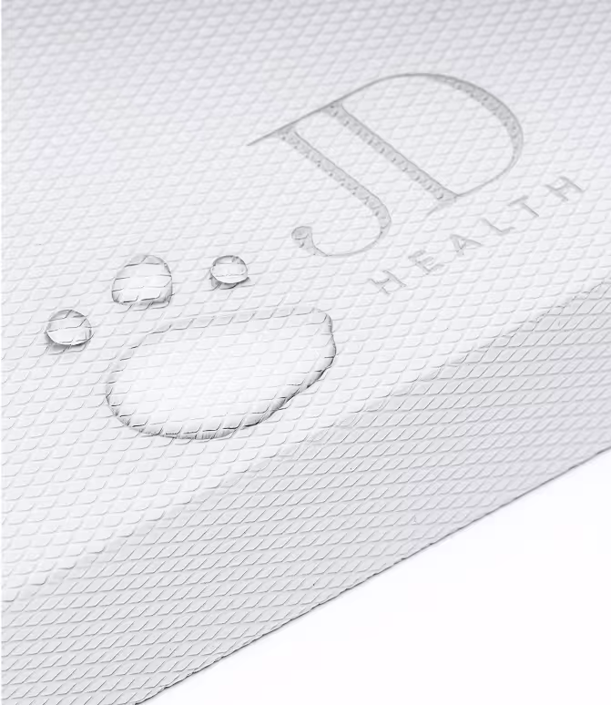 Water droplet on JD Health Balance Pad surface, demonstrating its waterproof, textured design for versatile use.