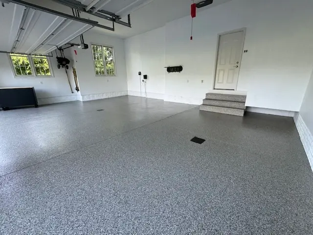 garage floor with a new polyaspartic flake coating