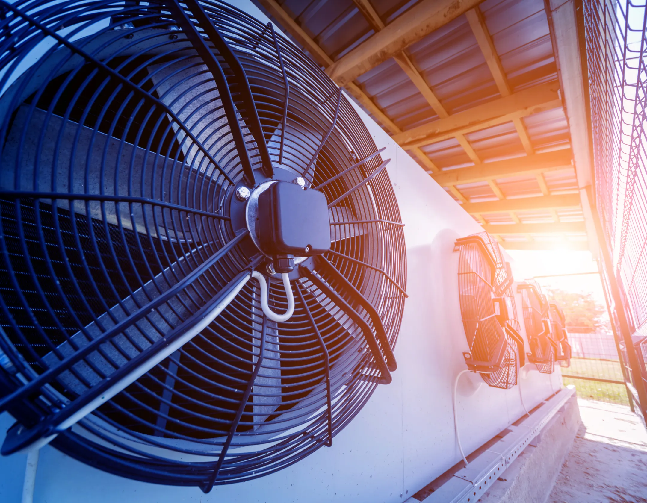 A close up of a row of large fans. 