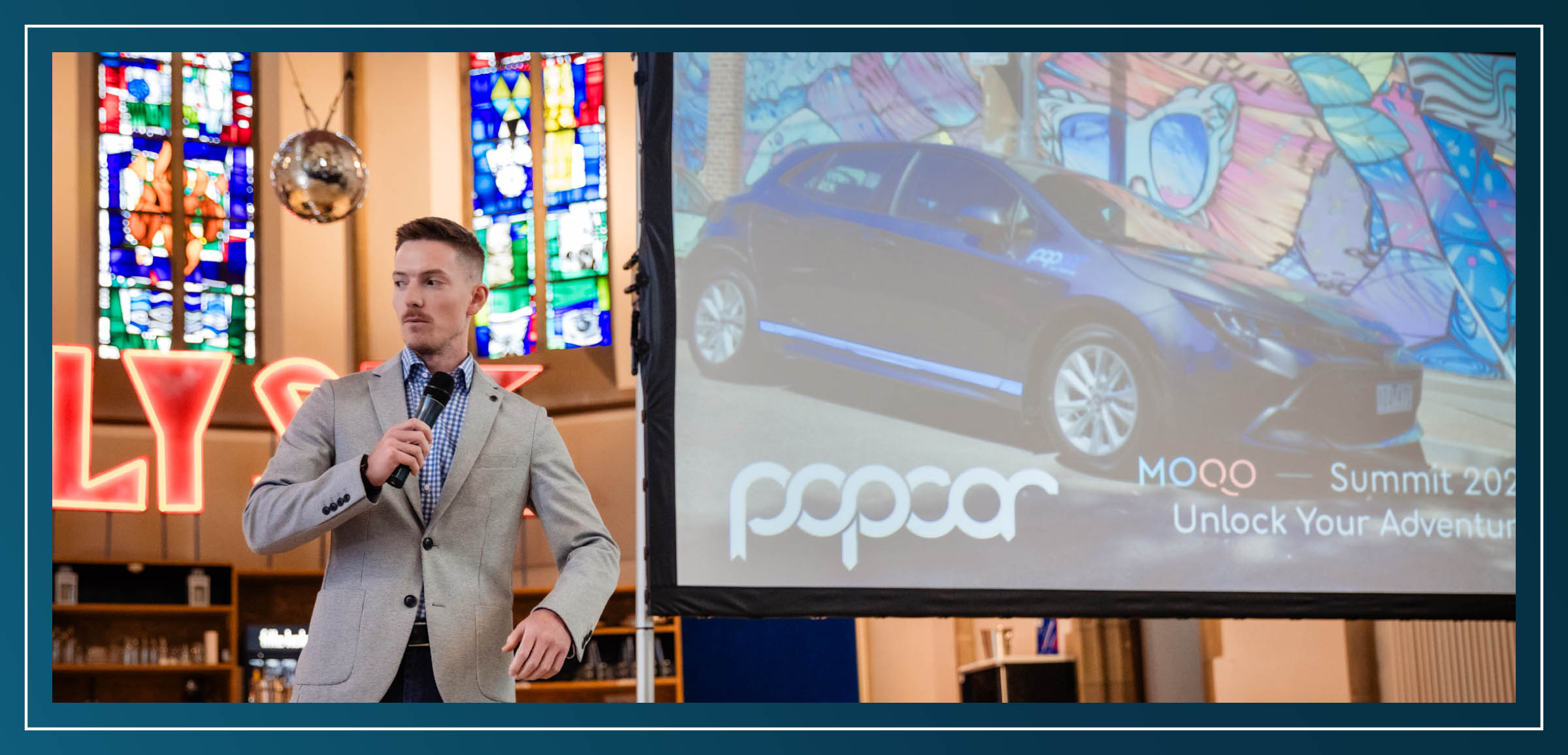 Dan Jamison from Popcar on stage at MOQO Summit 2024
