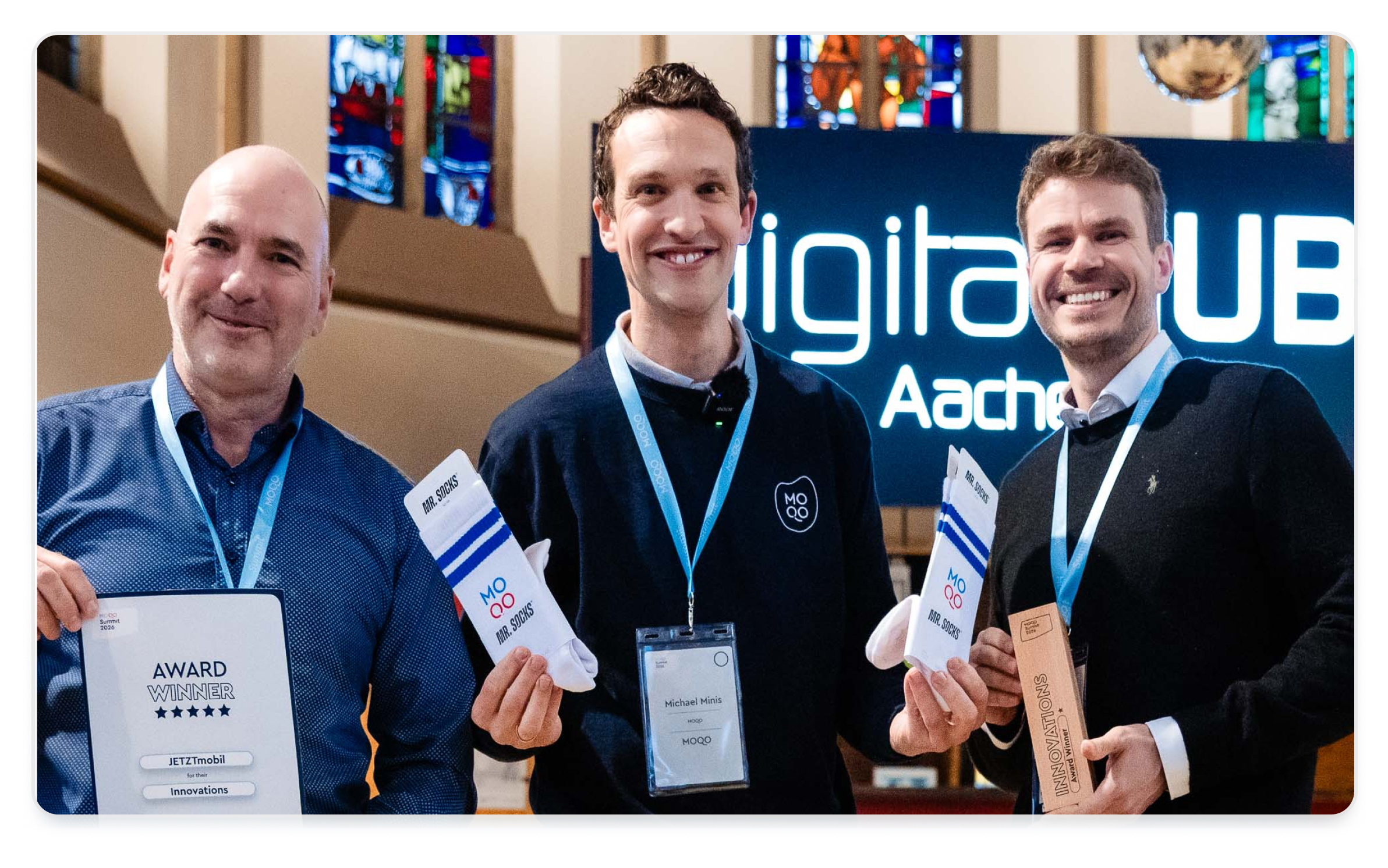 JETZT mobil represantatives together with MOQO CEO Michael Minis in he Digital Church in Aachen during the MOQO Summit 2026, when JETZT mobil won the MOQO Award for its innovative business model