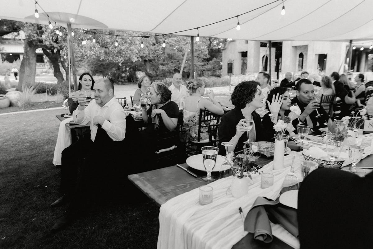 People talking and sharing discussion at dinner.