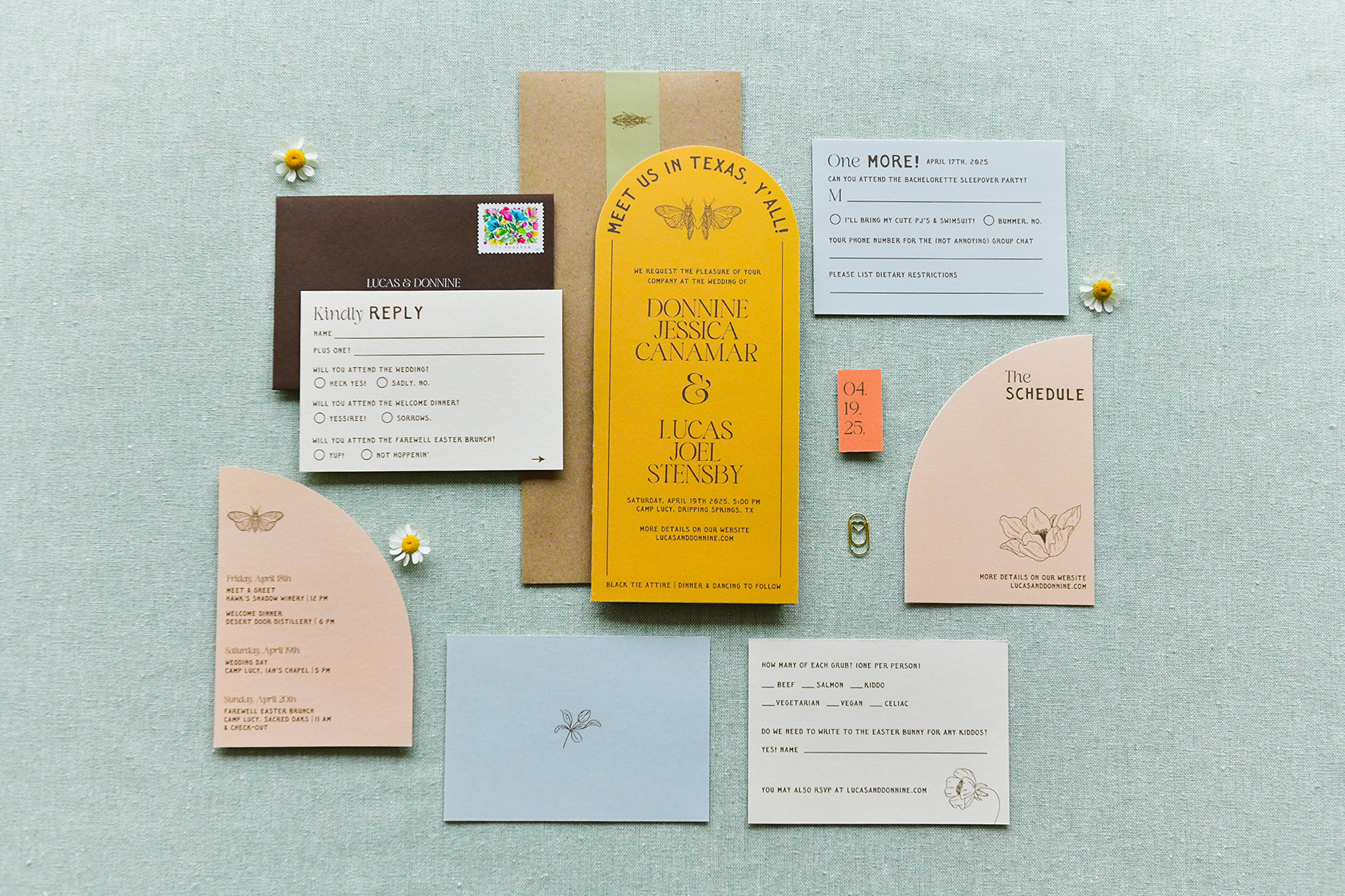 A yellow arch with multiple pieces of multi-colored inserts that fit together in the envelope.