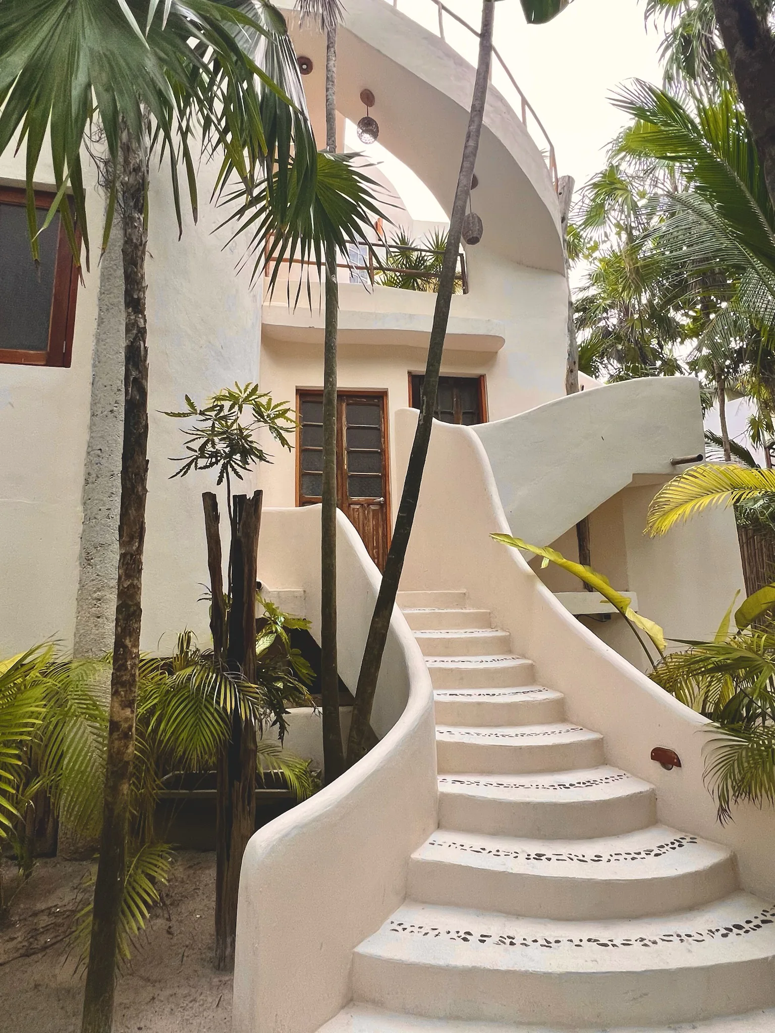 View of the front steps of a villa in Tulum.