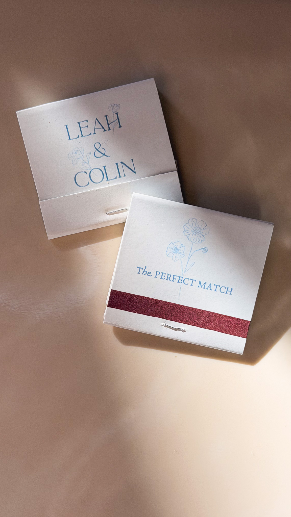 matchbooks on a table with the couple's names and "the perfect match"