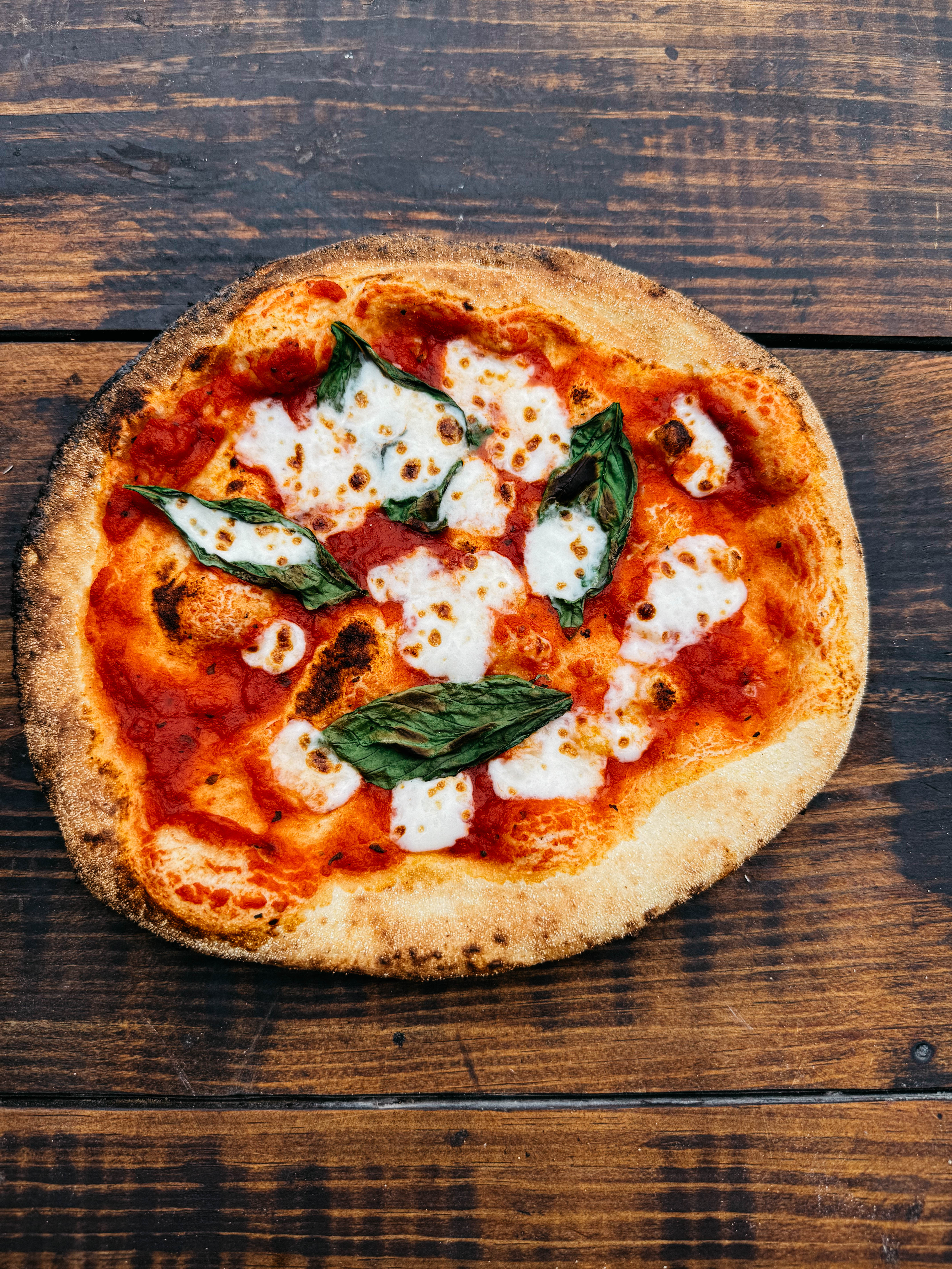 image of pizza baking in the oven